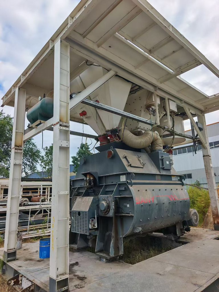 Actual side view of the SANY HZS180 mixer unit, hoppers and air receiver on the steel frame